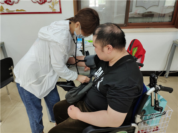 五福家園殘疾人之家:義診活動進(jìn)社區(qū)
